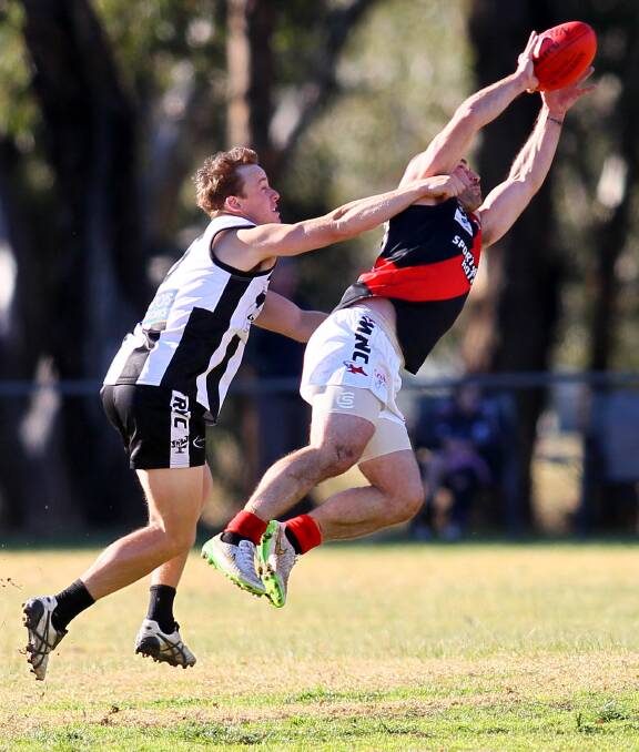 SOARING SUCCESS: Marrar footballer Jeremy Rowe soars through the air to take a strong mark against The Rock-Yerong Creek earlier in the season. Picture: Les Smith