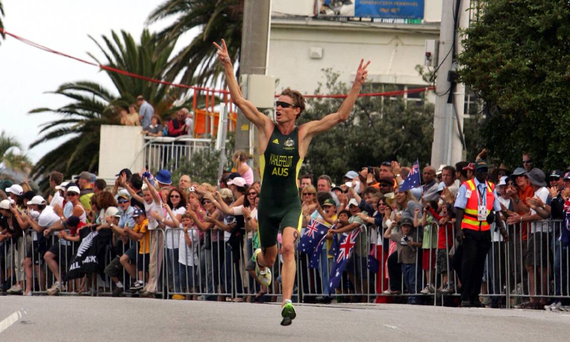 SPECIAL MOMENT: Wagga's Brad Kahlefeldt races to a gold medal victory in the men's triathlon at the 2006 Commonwealth Games in Melbourne. Picture: Kerrie Stewart