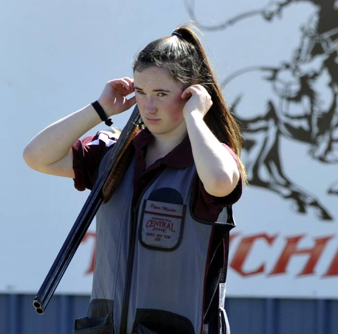 FUTURE: Canberra 15-year-old Piper Michie prepares for the A grade event at the state trap titles at Wagga's National Shooting Grounds on Saturday.