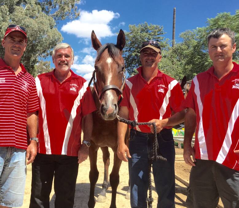 MATESHIP: Collingullie supporters Shane Lenon, Tony Pritchard, trainer Scott Spackman and Phil Harris with Condoleza Clarkie ahead of her debut at Tumut on Saturday. Picture: Matt Malone