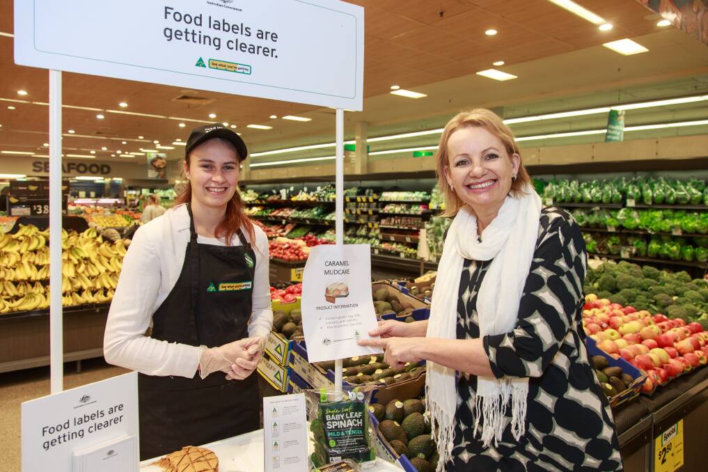AUSSIE-MADE: Melinda Hooton and Farrer MP Sussan Ley at the country of origin label demonstration at Albury Woolworths on Friday. Picture: SIMON BAYLISS