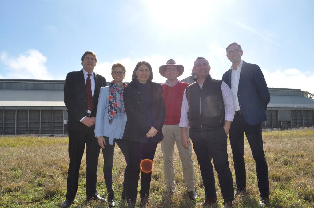 DROUGHT FOCUS: Premier Gladys Berejiklian with Coolamon Shire Council General Manager Tony Donoghue, Cootamundra MP Steph Cooke, agriculture minister Adam Marshall, deputy premier John Barilaro and treasurer Dominic Perrottet in Coolamon on Tuesday. Picture: Olivia Calver