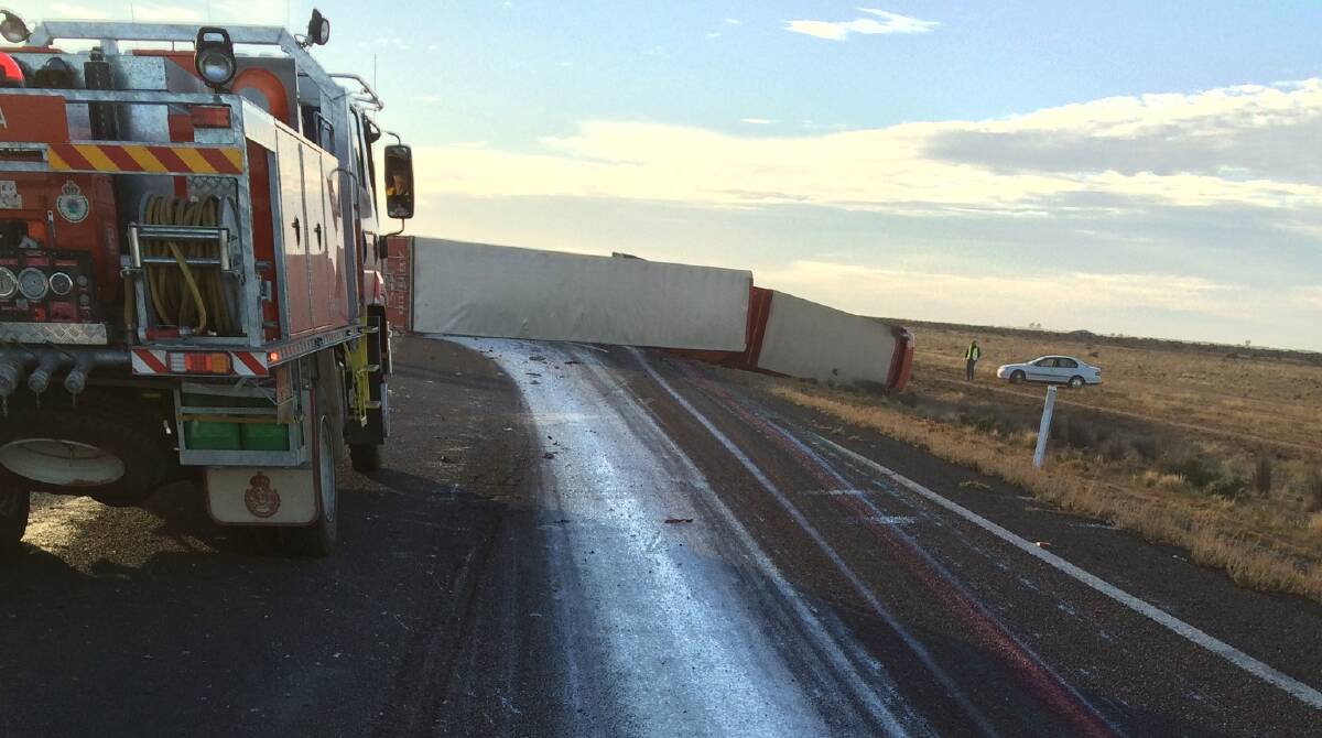 A truck driver suffered minor injuries in a rollover near Hay on Monday morning. Picture: Supplied