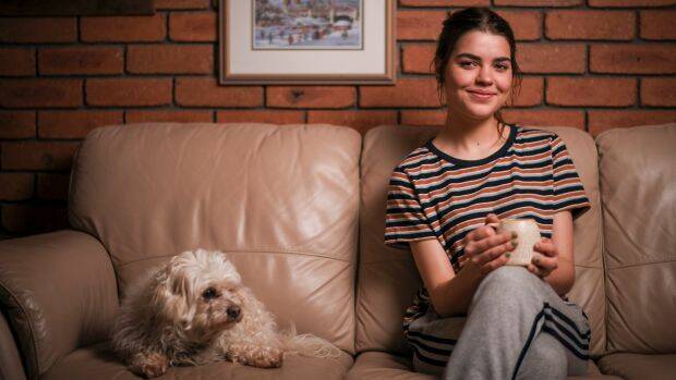 Jeri Packham, seen here with her dog Scruffy, says she was asked to leave her school after she failed a unit of VCE English. Photo: Eddie Jim