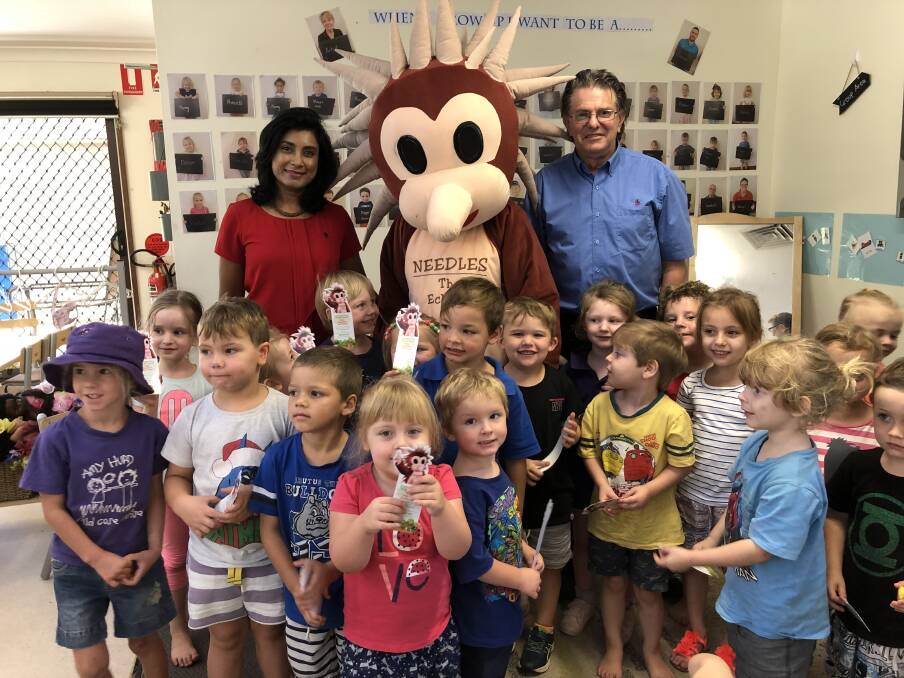 LOCAL CELEBRITY: The council's environmental health coordinator Sharomi Dayanand, Needles, and environment officer Geoff Lang visit the Amy Hurd Early Learning Centre.