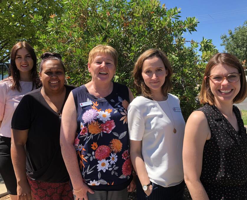 A HELPING HAND: The Smith Family staff Emma Corcoran, Maxine Honeysett, Christine Dennis, Louise Neilsen, and Rebecca Vick work closely with underprivileged youth throughout Wagga to help them achieve their best at school.