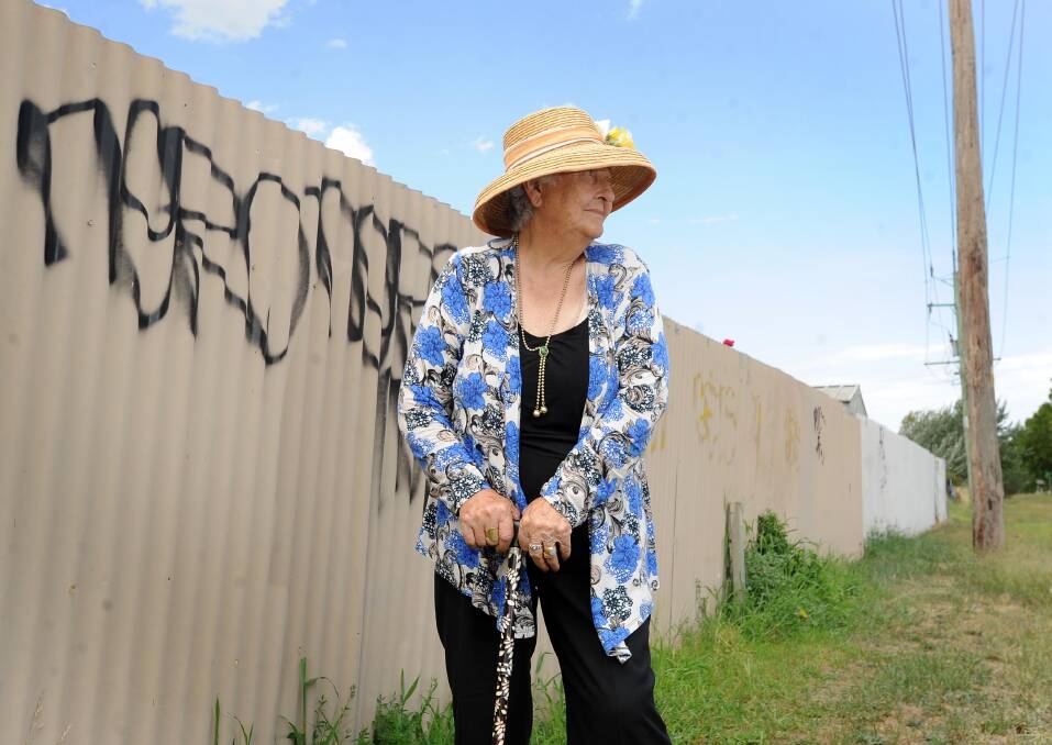 ATTACKED: 85-year-old Gumly woman Laura Evans was left feeling hurt and helpless after vandals defaced her front fence. Picture: Laura Hardwick