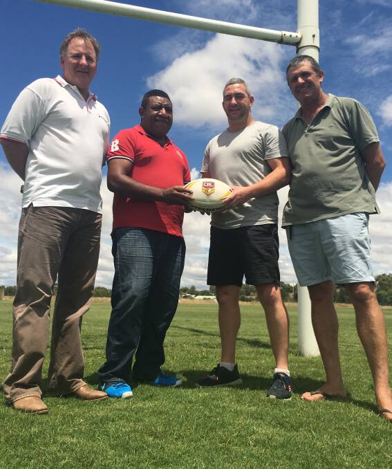 NEW INITIATIVE: Phillip Ryan, Sampson Kimisopa, Matt Ward and Bill Casley are busily preparing to bring a Papua New Guinean team out to Wagga to play Southcity in March. Picture: Courtney Rees
