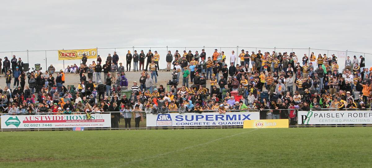 Part of the crowd on the hill in the grand final between Southcity and Gundagai last year. The decider will be played under lights for the first time at Equex Centre.