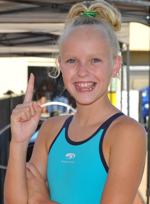 BIG EFFORT: Year seven student Meg Senior, 12, broke six records at the Wagga High swimming carnival on Thursday night including one set 45 years ago. Picture: Kieren L Tilly