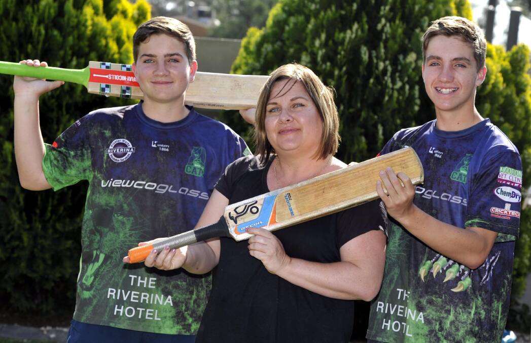FRESH START: New Wagga cricket operations manager Melinda Rosengren is ready for a big season of cricket with sons Cooper, 13, (left) and Harry, 14. Picture: Les Smith