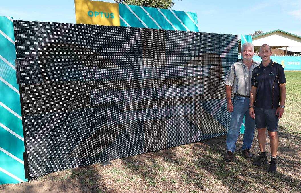BIG ADDITION: Wagga Rugby League chairman Warren Barlay and Optus franchisee Wally Pasquali at the unveiling of the new scoreboard heading to Equex Centre. Picture: Kieren L Tilly