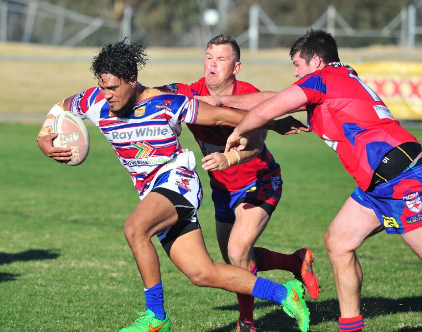 STRENGTH: Young halfback Ray Talimalie tries to break free of Ben Jeffery's tackle attempt during the win over Kangaroos at Equex Centre on Sunday. Picture: Kieren L Tilly