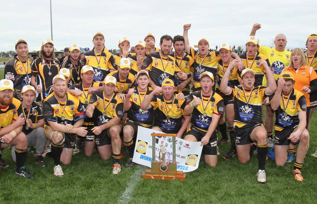 THREE OF THE BEST: Gundagai celebrates its come from behind win over Southcity on Sunday to claim a third straight reserve grade premiership. Picture: Les Smith