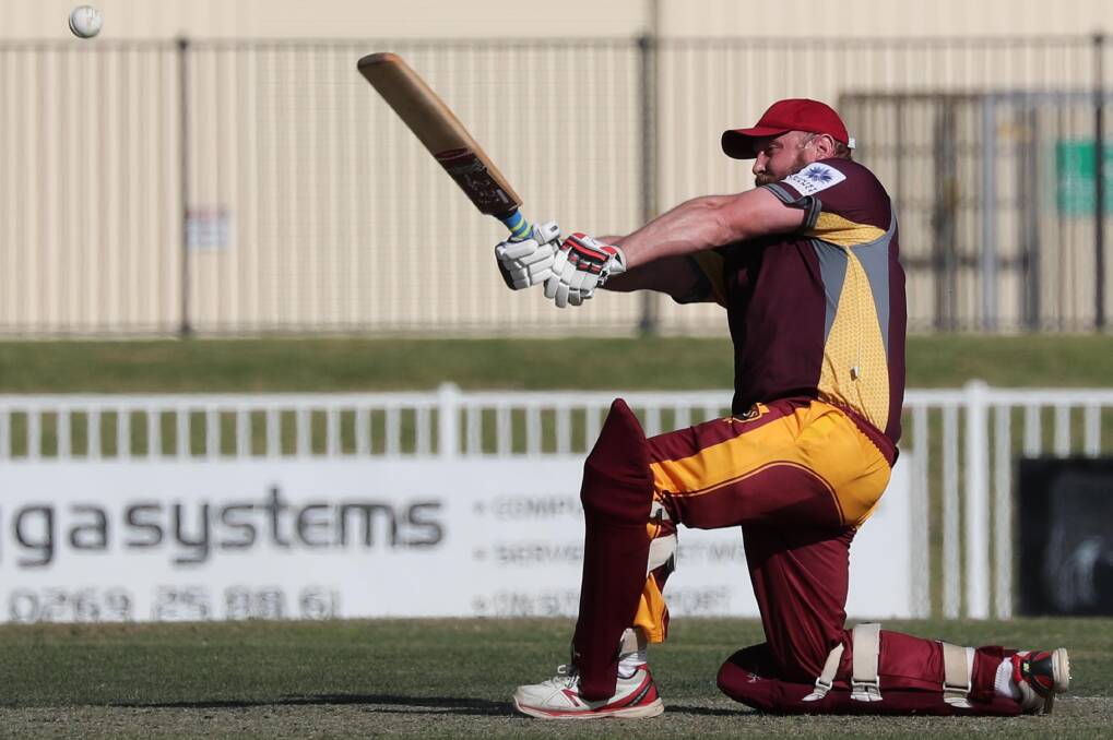 SMASHING SHOT: Lake Albert vice captain Kurt Robertson launches another delivery towards the boundary on his way to an unbeaten 59 on Saturday. Picture: Les Smith