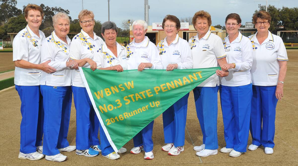 STRONG EFFORT: Rules Club grade three pennant team of Anne Leonard, Carole Freemna, Cheryl Darcy, Lynn Eggleton, Mona Thornton, Kay McMillan, Jenny Mitchell, Jan Fitzsimmons and manager Marie Williams display their runners up state pennant. Picture: Kieren L Tilly