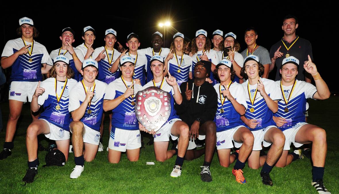 SWEET SUCCESS: Wagga High School celebrates its 16-14 Hardy Shield grand final win over Kildare Catholic College at Parramore Park on Tuesday night . Picture: Kieren L Tilly