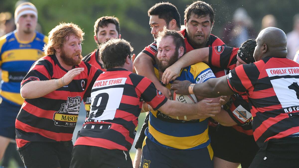 TEAM EFFORT: Albury prop Gethin Cattle gets surrounding by Tumut players as he looks to make more ground in the win over the Bulls at Murrayfield on Saturday.