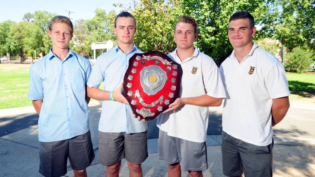 BRAGGING RIGHTS: Kildare's Jake Mascini and Sam Heffernan are out to keep the Hardy Shield off Wagga High's Matt Fellows and Ryan Cronin. Picture: Kieren L Tilly