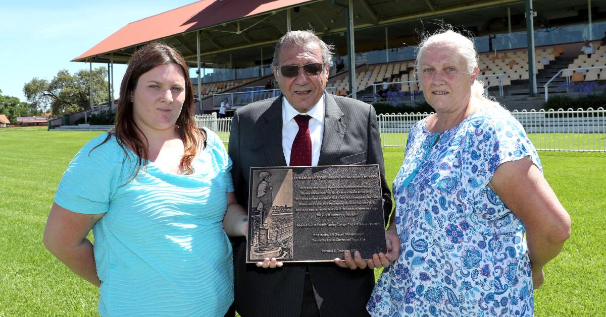 SPECIAL MOMENT: Tegan Ellis, Melbourne's 'punting priest' Fr Joe Giaccobe and Louise Clayton at the official unveiling of a plaque honouring fallen jockeys.