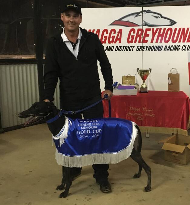 ALL SMILES: Owner Paul Blackmore celebrates Max Destruction's win in the Graeme Hull Memorial Wagga Gold Cup on Friday night. Picture: Courtney Rees