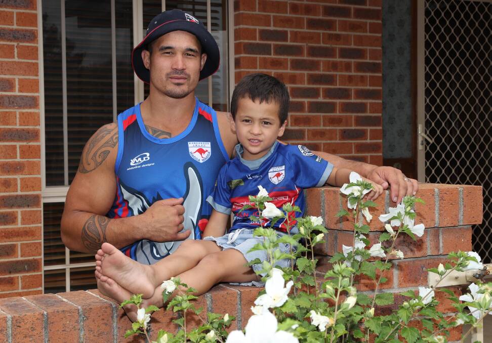 CHANGING COLOURS: New Kangaroos forward Dana Ratu, pictured with four-year-old son Trey, is looking forward to a new opportunity for his family in Wagga. Picture: Les Smith