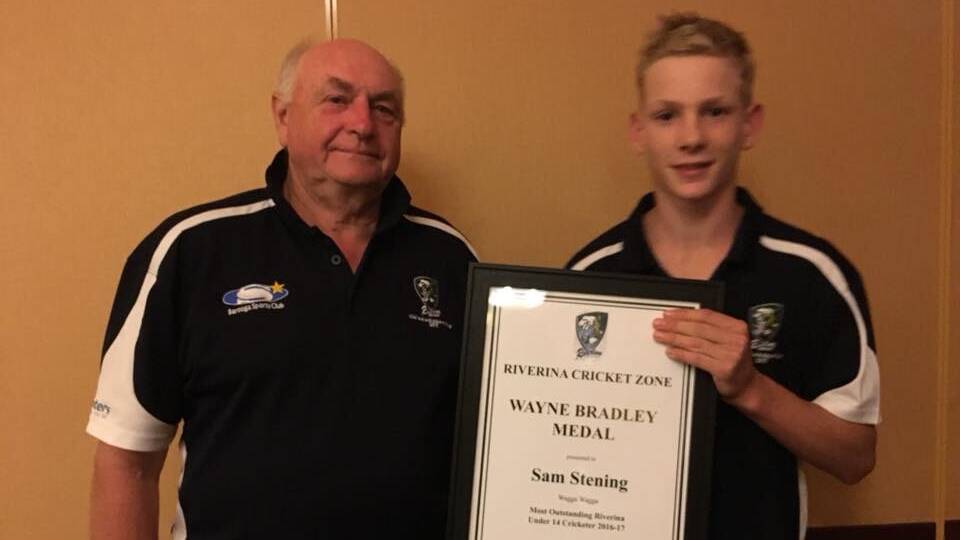 Sam Stening receiving his Wayne Bradley Medal as the best under 14s cricketer in the Riverina.