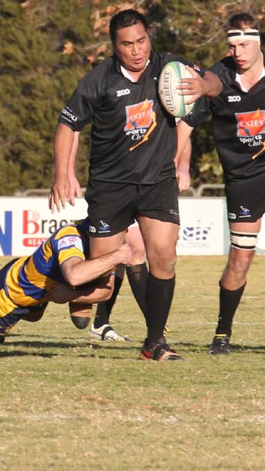 ON THE CHARGE: Centre Enoch Tia charges forward in Griffith's big loss to Albury at Exies Oval on Saturday. The Blacks are still yet to win a game this year. Picture: Anthony Stipo