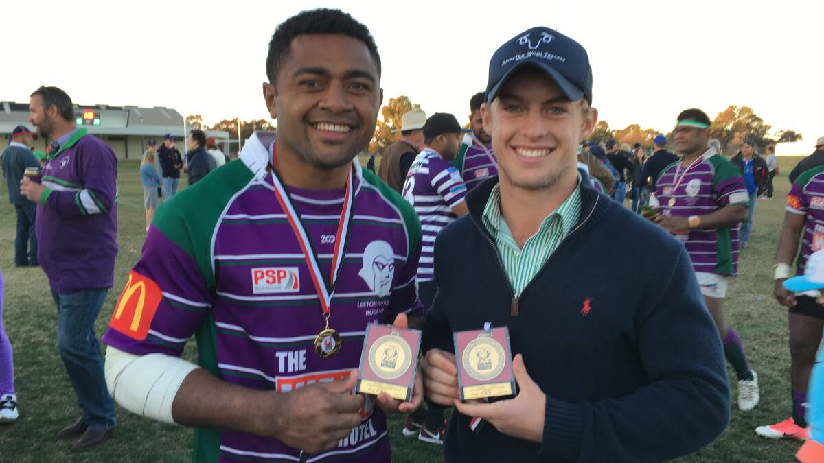 ALL SMILES: Noa Rabici and Cameron Duffy show off their Bill Castle Medal wins after the presentation following the grand final on Saturday. Picture: Courtney Rees