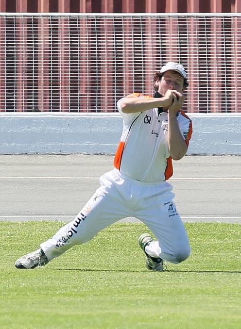 Wagga RSL's Henry Standley takes a catch at Wagga Cricket Ground on Saturday.
