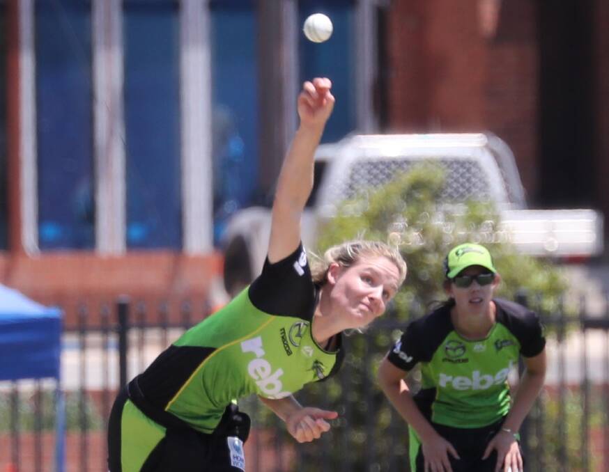 Nicola Carey sends down a delivery in the second of the WBBL matches.