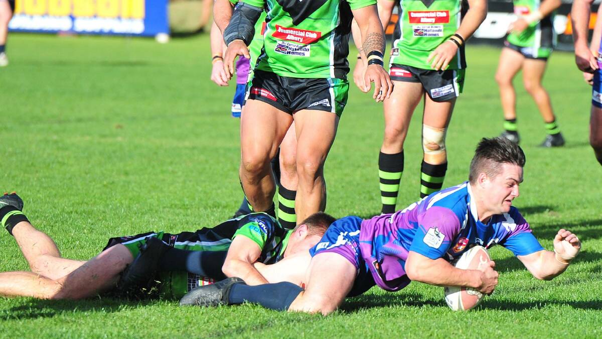 TRY TIME: Jordan Shepherd goes over for one of Southcity's 10 tries against Albury on Sunday. Picture: Kieren L Tilly