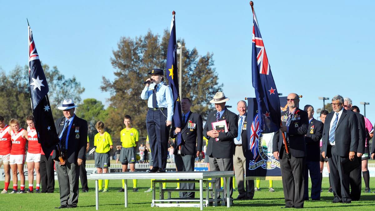 The Anzac Day cemermony at the commemorative games at Robertson Oval in 2016.