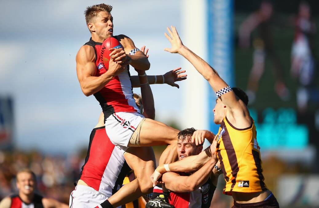 HIGH FLYER: Sean Dempster of the Saints jumps to take a mark during the round four AFL match between the Hawthorn Hawks and the St Kilda Saints. (Photo by Mark Kolbe/Getty Images)