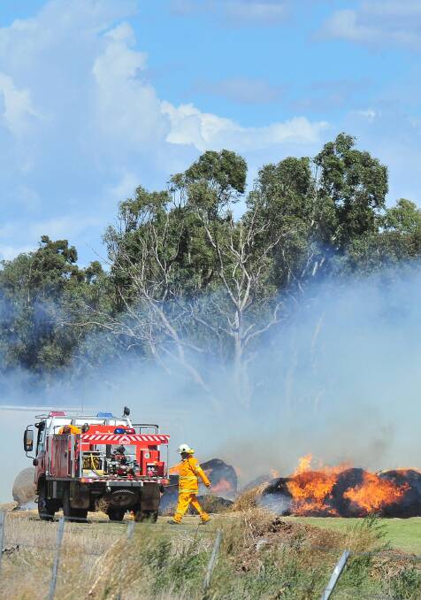BALE BLAZE: Fire crews bring a hay bale fire in North Wagga under control.