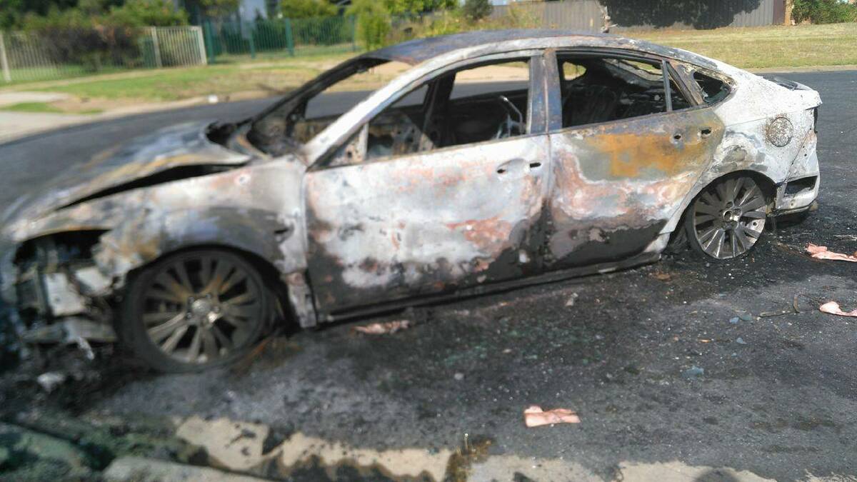 UNDER FIRE: The owner of this car, burned out over the weekend, has forgiven the arsonist and thanked all those who helped him.