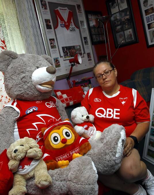 Heather Tilden with some of her Swans gear.