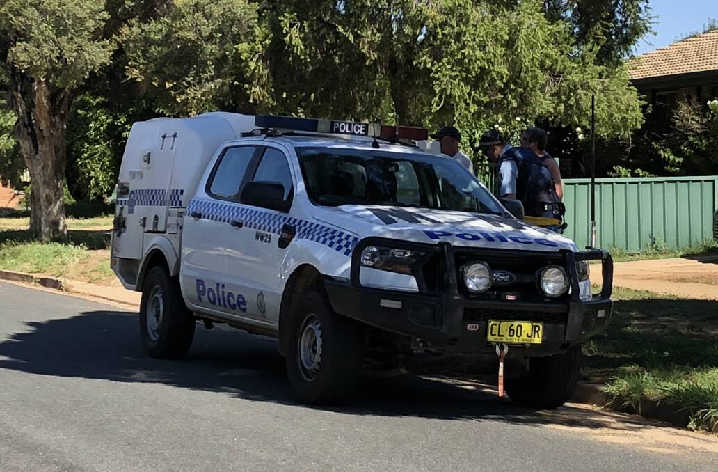 ARRESTED: Police arrest a man and a teenager after an operation in Ashmont on Wednesday afternoon. Picture: Marguerite McKinnon