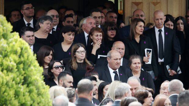 A thousand sombre mourners gathered to pay their respects to Tony Sergi. Photo: Andrew Meares