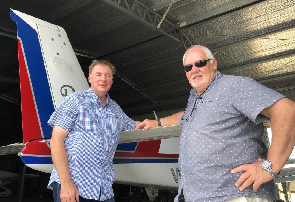 TURBULENT TIMES: Wagga City Aero Club president Geoff Breust (left) says the council's plan to impose new fees on pilots will discourage them from flying to the city.