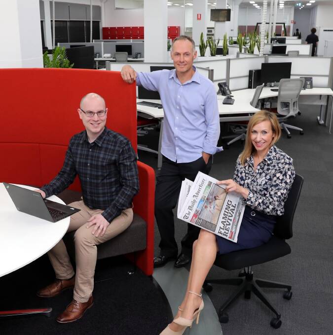 MODERN MOVE: Editor Ross Tyson, sports journalist Peter Doherty and news journalist Marguerite McKinnon at the paper's new building. Picture: Les Smith