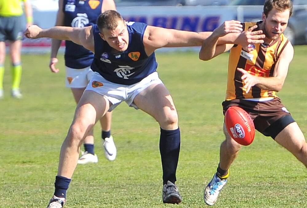 FREE TO PLAY: Coleambally coach Josh Hamilton, left, in action against East Wagga-Kooringal last week. Picture: Kieren L Tilly