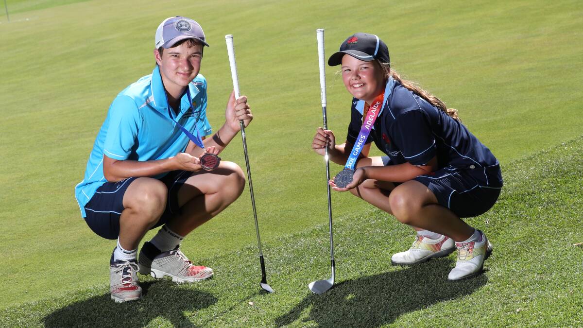PROMISING PAIR: Hugo Currie and sister Josie with their medals at the Wagga Country Club on Tuesday. Picture: Les Smith