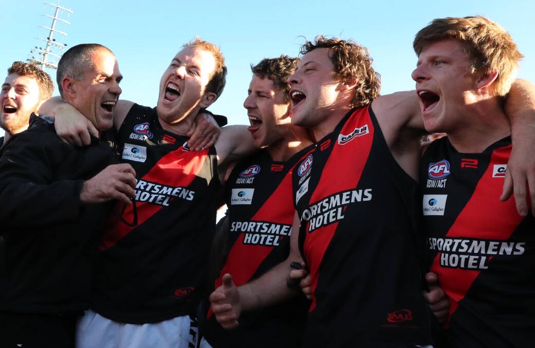 Marrar coach Shane Lenon celebrates with his players after last year's premiership. Picture: Les Smith