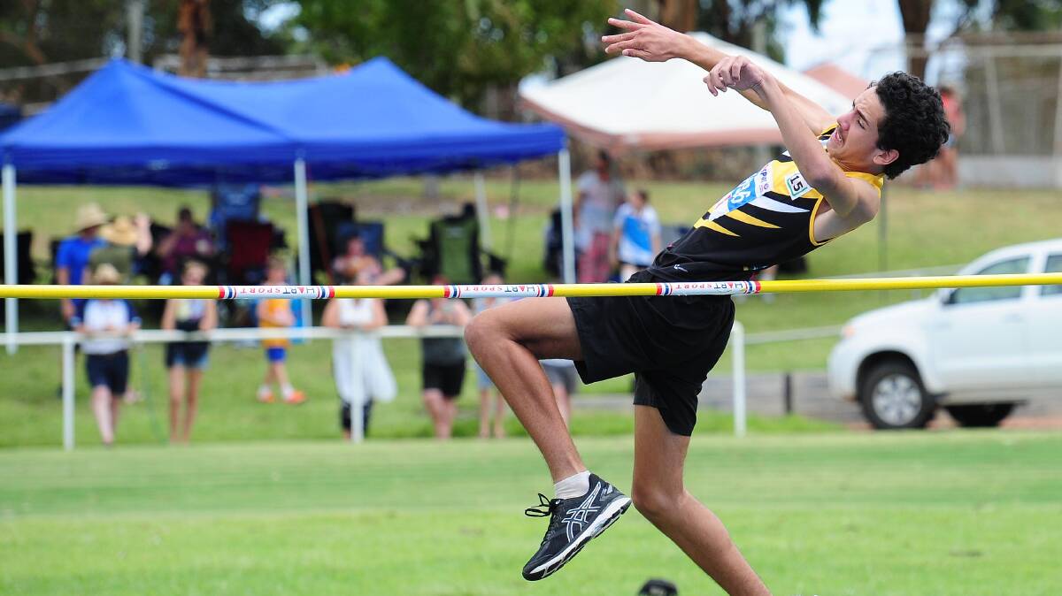 AIMING UP: Latrell Goolagong, 14, from host club Wagga competes in the high jump on Sunday at Jubilee Park. Picture: Kieren L Tilly