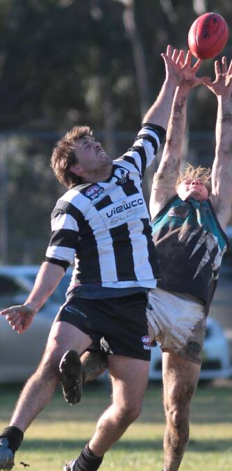 Mitch Stephenson, left, playing for TRYC against the Northern Jets this year. Picture: Les Smith