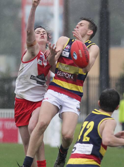 A wet winter forced the Riverina League to take its biggest day away from Narrandera for the first time in 18 years. And the heavens opened on Robertson Oval. Pictures: Les Smith and Laura Hardwick