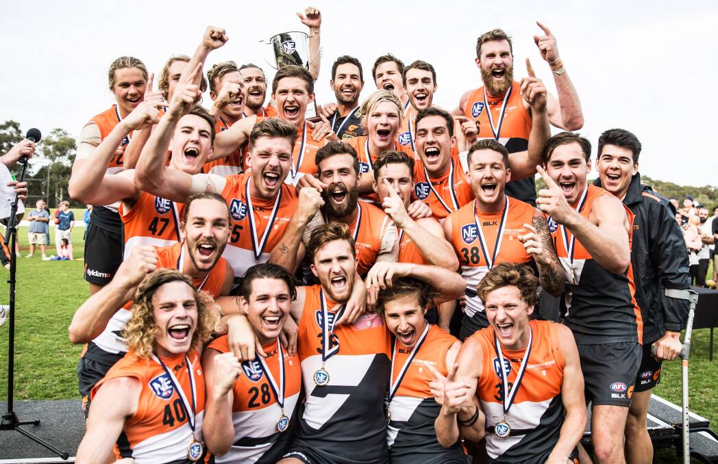 GIANT SUCCESS: Riverina footballers among the celebrating GWS reserve grade side after Sunday's pulsating grand final win over the Swans. Picture: GWS Giants
