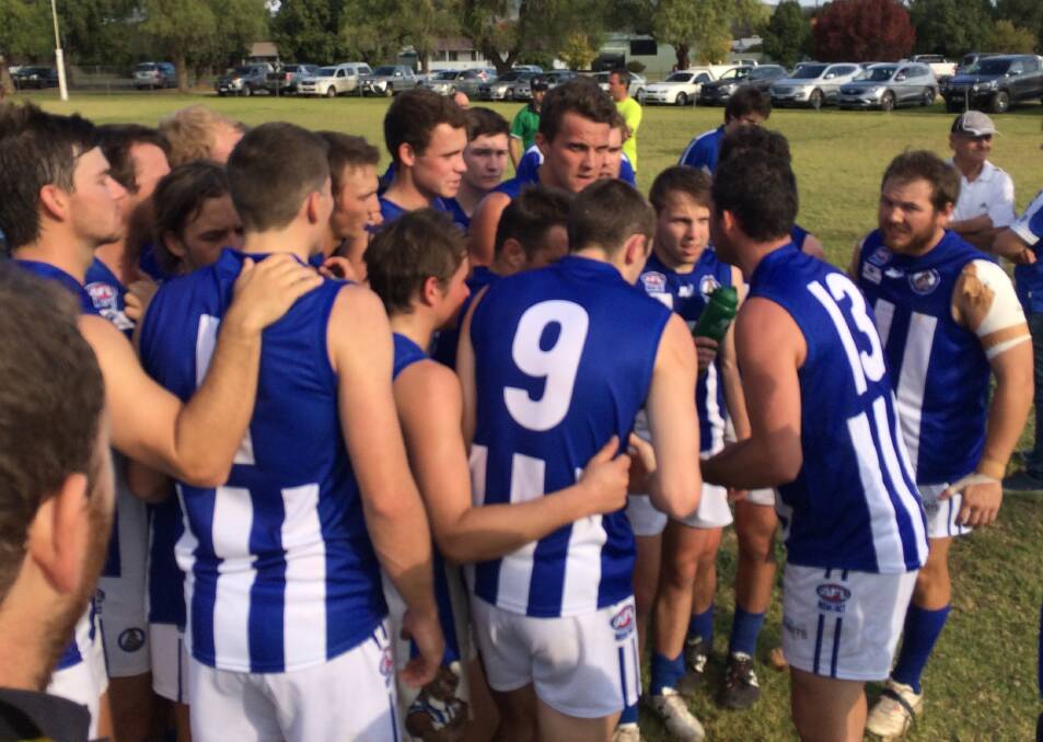 Coach Jake Wooden addresses Temora at quarter-time. His three-quarter-time speech got the desired result.