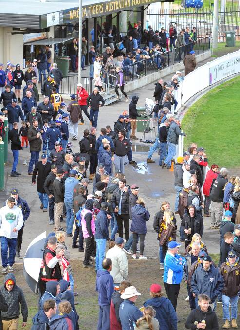 HARDY FANS: The weather affected the gate at the Farrer League grand final.